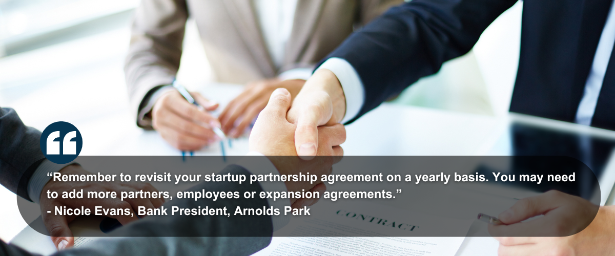 Image Of A Small Business Owner Looking Over A Small Business Partnership Agreement Following Quote