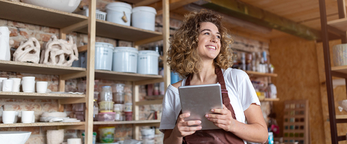 Image of a Business Owner Holding a Tablet