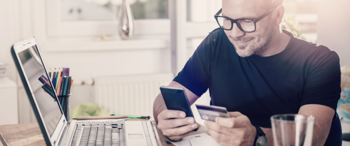 Image of a Business Man on his Computer