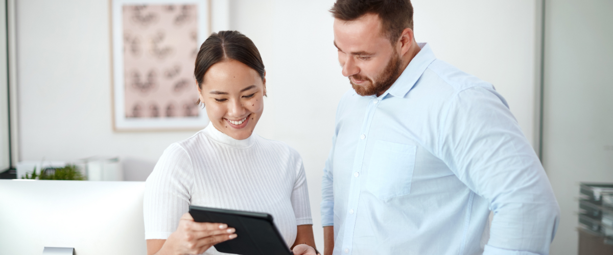 Two Business Owners Discussing Their Business Strategy For A Small Business Partnership