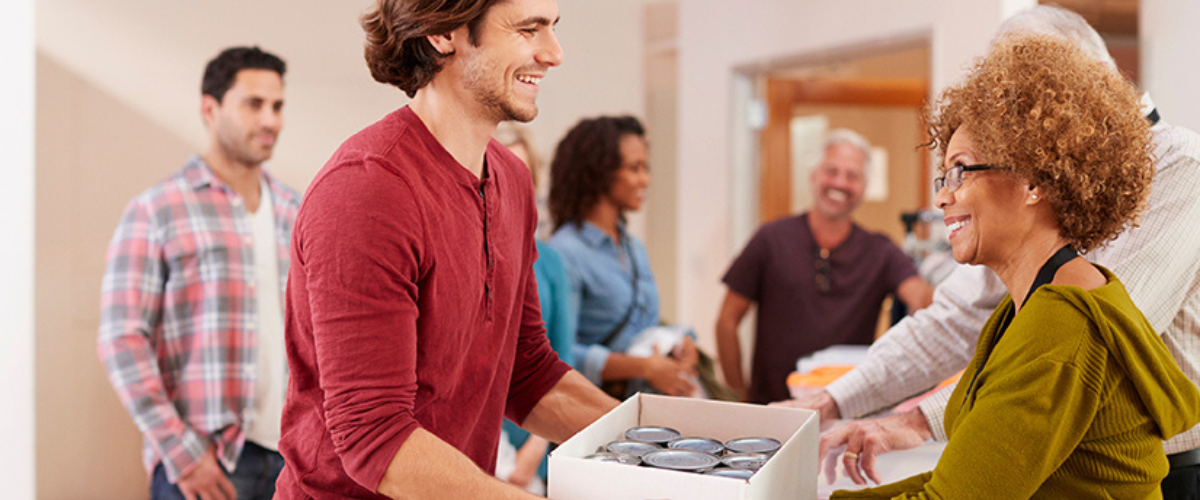 Image of Group of People Giving Donations