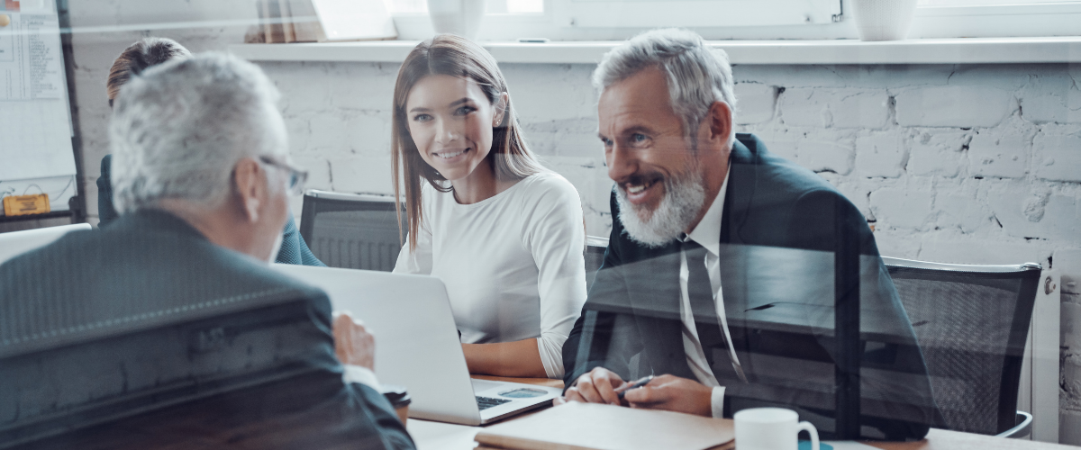 an image of a small business owner with experts, like a banker, CPA or attorney.