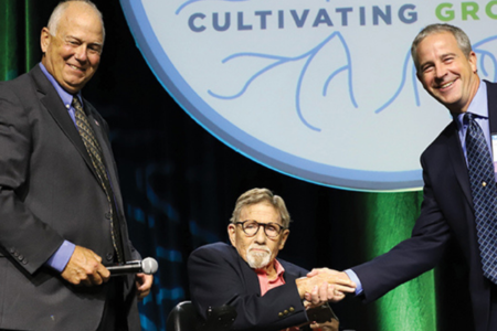 Image Of Neal And Dwight Conover Accepting The Leach Leadership Award