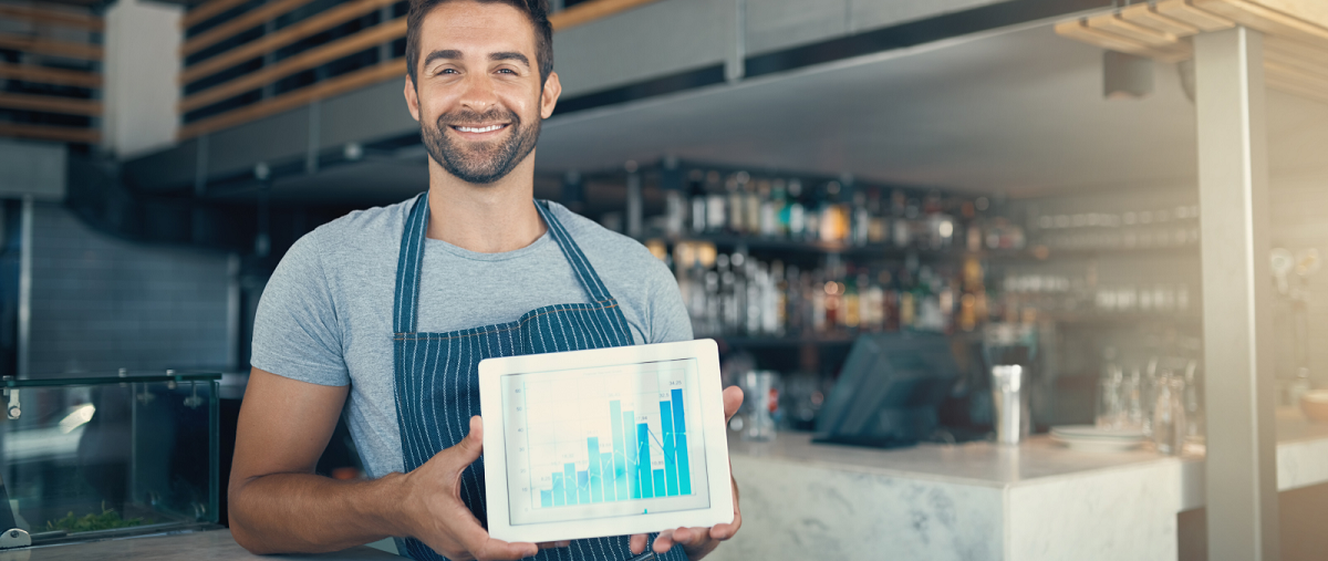 Man with chart on tablet