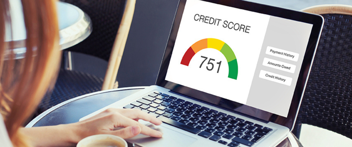 Image of Laptop with Credit Score Rating Displayed