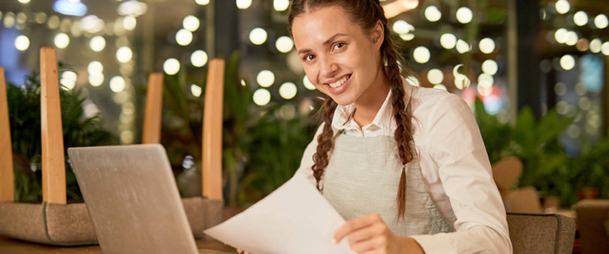 Image of Teen on Computer at Job