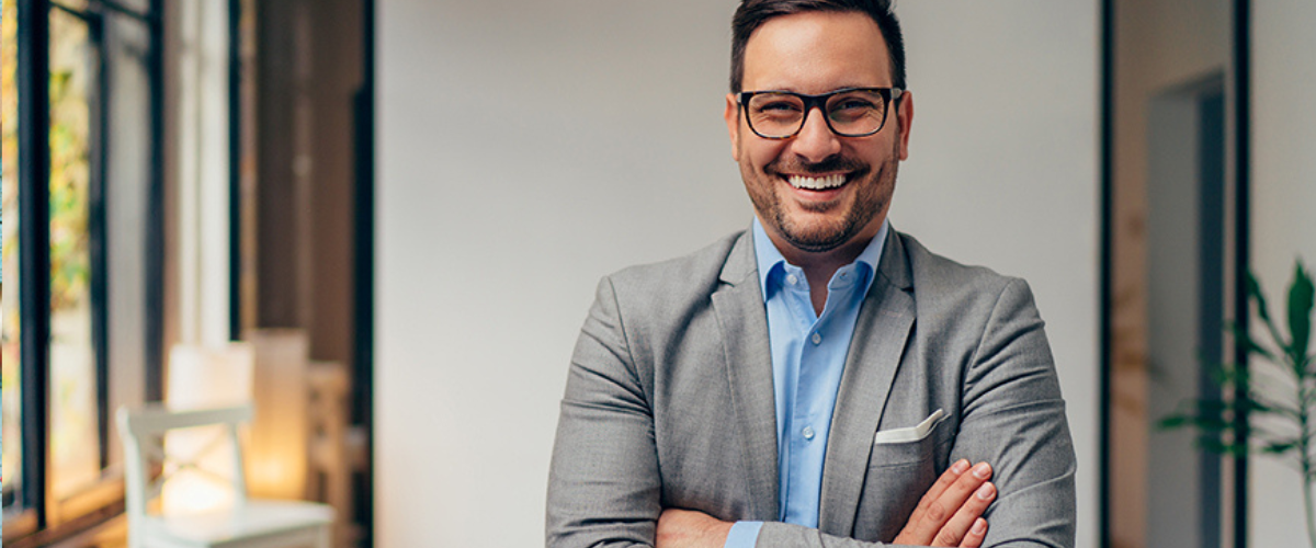 Image of Man Standing at Desk