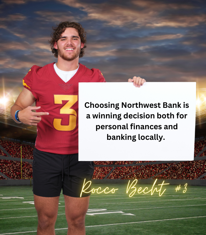 Image Of Rocco Becht With A Sign Saying Choosing Northwest Bank Is A Winning Decision.