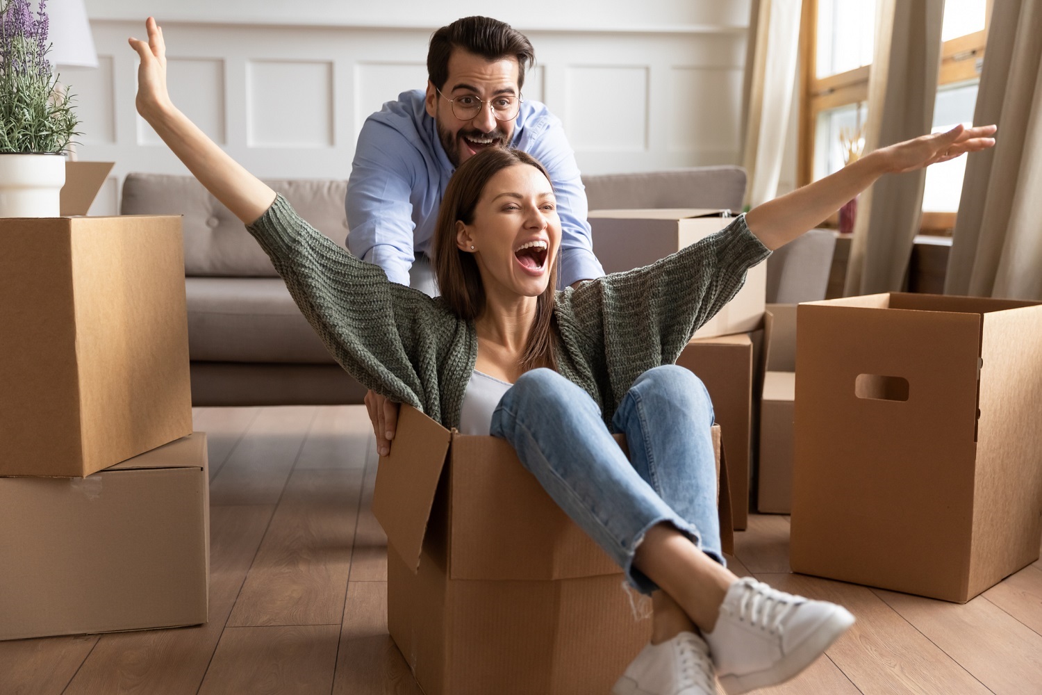 Couple unpacking house