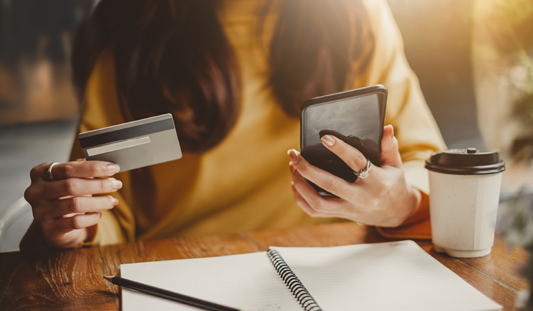 Image Of Customer Looking At Their Phone