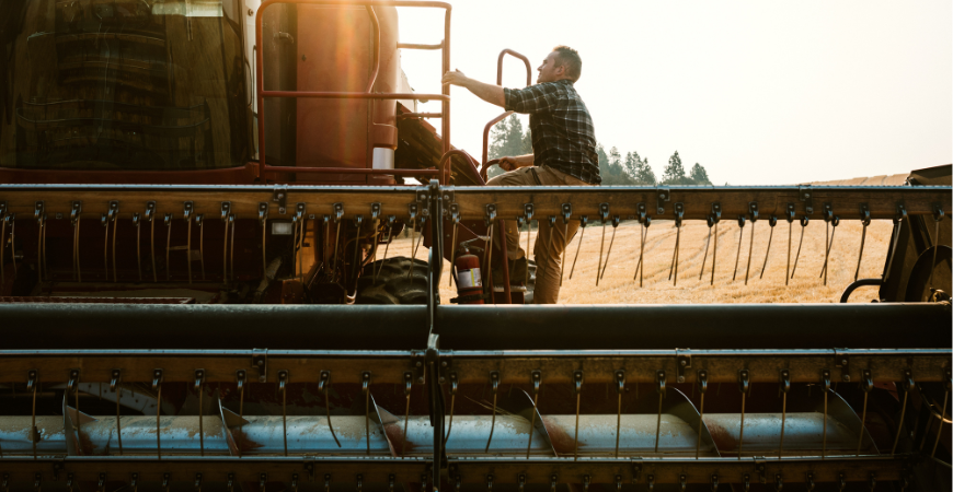 Farmer On His Combine During Harvest