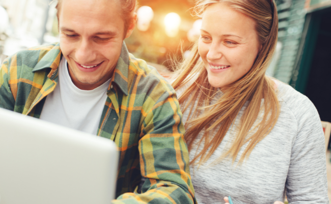 Couple Looking At Their Accounts Online