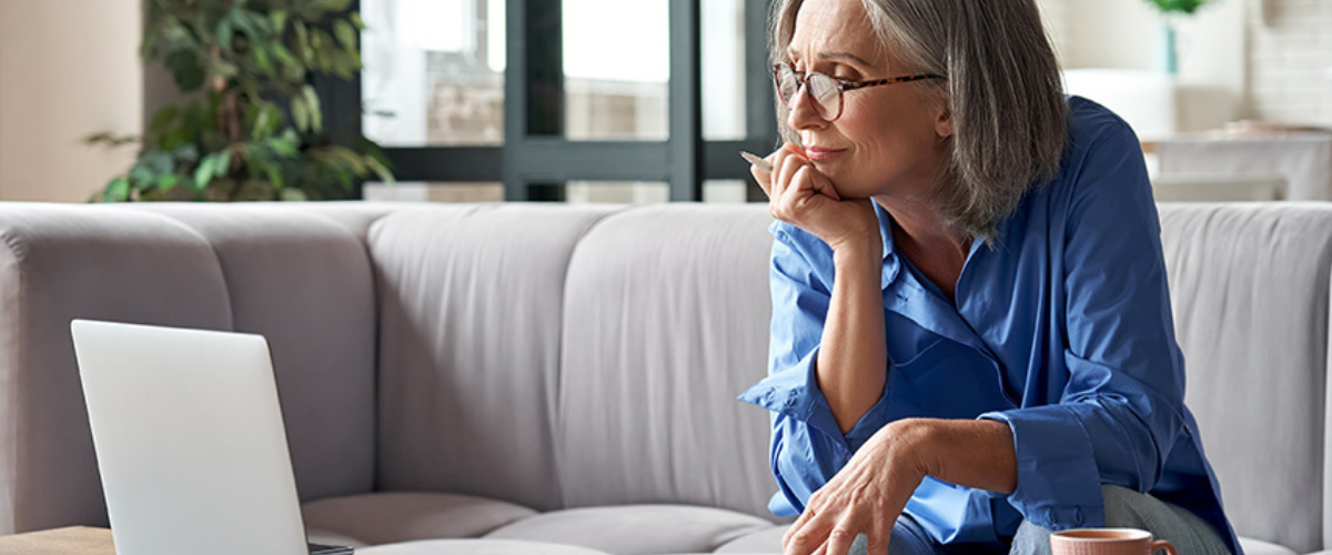 Image of Woman Looking at Computer