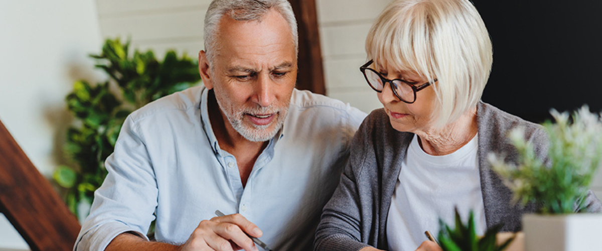 Image of Couple Looking at Papers